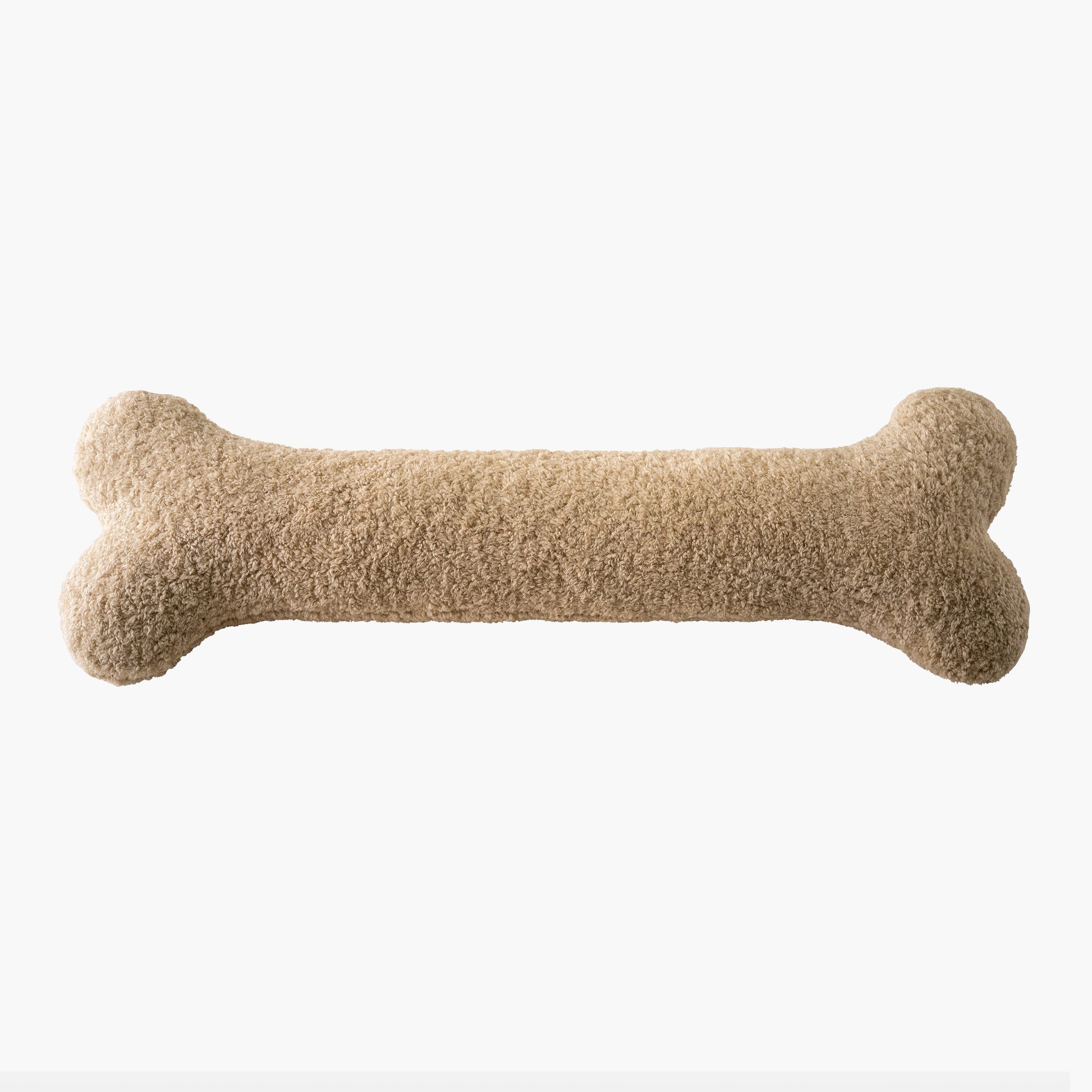 Warm beige bone pillow flat lay