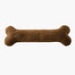 Caramel brown bone pillow flat lay